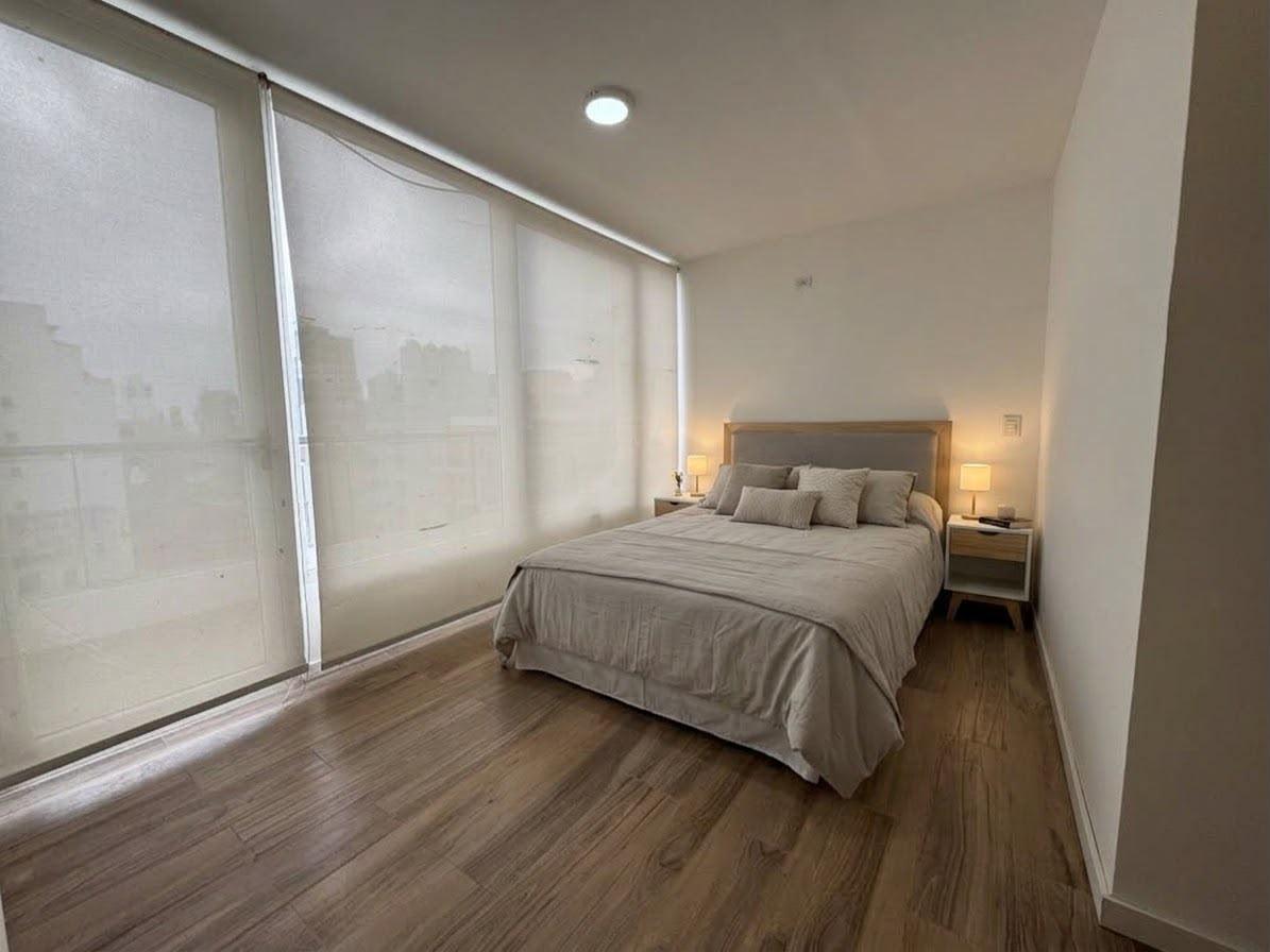 venta departamento un dormitorio balcon corrido zona parque españa pichincha